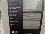 packaging of a bed in a box on a bed in a store