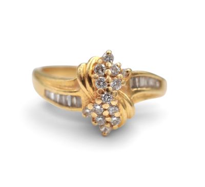 an image of a gold ring with diamonds on it