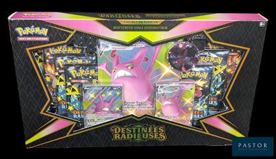the box is full of pokemon cards and a pink pokemon figure
