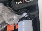 a black box with a bottle of water and a charger