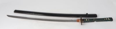 a knife that is laying on top of a table