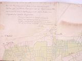 an old map of a town on top of a piece of paper