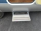 a car with a ramp attached to the side of it
