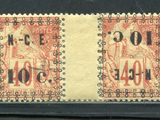 deux vieux timbres-poste sur lesquels figurent un homme et une femme