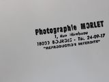 a white plate with a black and white photo on it