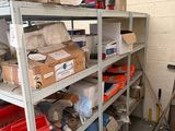 many boxes and boxes on the shelves in the garage