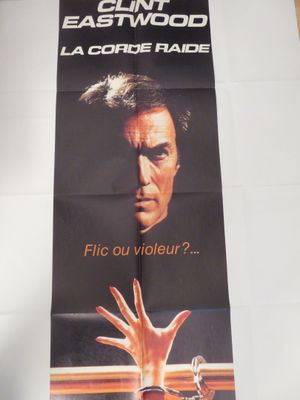 affiche de film représentant la main d'un homme sortant par la vitre d'une voiture