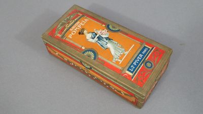 a small box with a picture of a woman on it