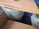 a box that has some flowers in it on a table