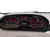 a close up of a car dashboard with a speedometer and gauges