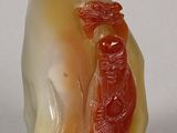 a picture of a figurine of a man and a woman