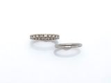 a pair of diamond rings on a white background