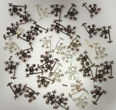 many snowflakes arranged in a circle on a white surface