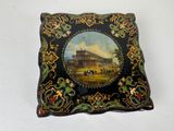 a picture of a decorative box with a painting on it