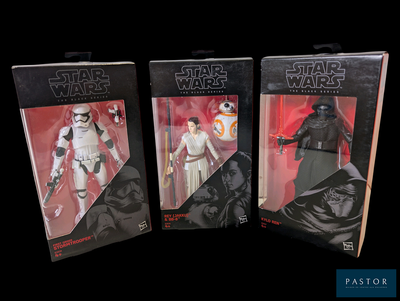trois figurines « Star Wars » exposées dans leur boîte