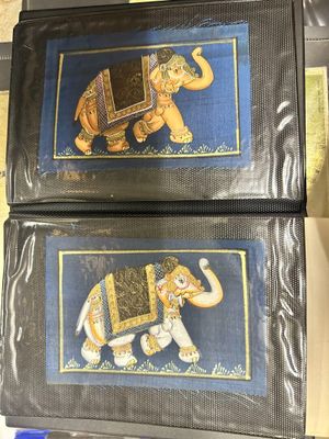 two pictures of an elephant on a blue background