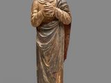 an image of a statue of a woman holding a baby
