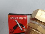an image of a brass fitting with a nozzle on a white surface