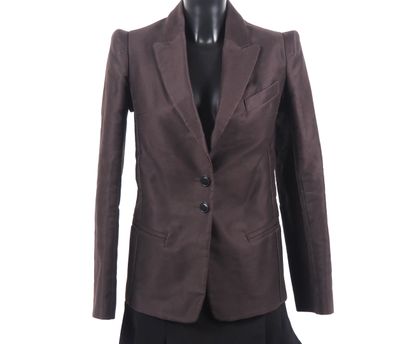 a woman ' s brown jacket on a mannequin mannequin mannequin mannequin mannequin mannequin mannequin mannequin