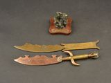two different types of metal items on a table