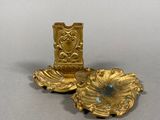 a gold object that is sitting on a table