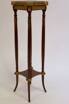 a small table with a clock on top of it