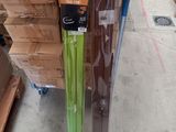 two umbrellas that are sitting on a cart in the store