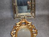un miroir et son cadre posés par terre