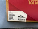 a box with a pair of vans old skool shoes on it