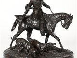 statue en bronze représentant un homme à cheval accompagné d'un chien