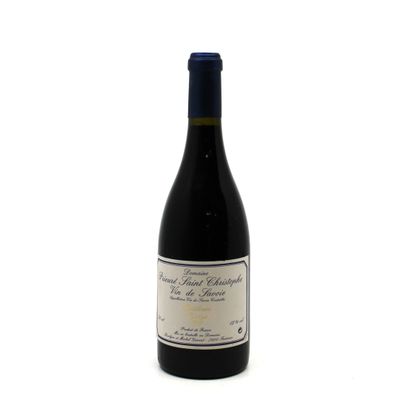 a bottle of wine that is sitting on a table