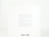 a white book with a black and white picture on it