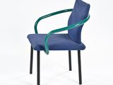 the chair is blue and has a green armrest on it