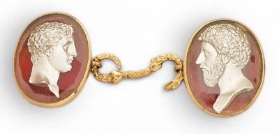 pair of gold - plated and red glass cameos of a man and a woman