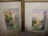 two framed pictures of a gondola and a gondola boat