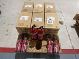 several boxes of soda are stacked on top of each other on the floor