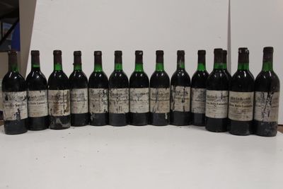 six bottles of wine are lined up in a row on a table