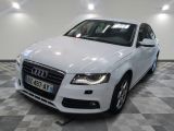 an image of a white audi car in a showroom