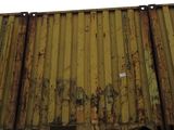 a yellow container sitting on top of a blue container