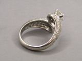 an image of a diamond ring on a table