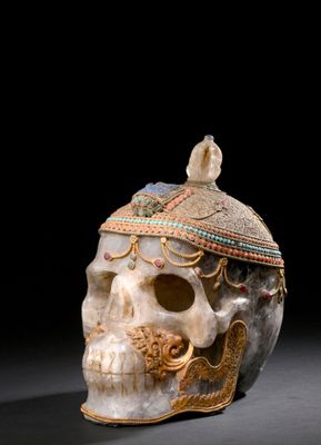 a close up of a skull with a hat on it ' s head