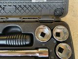 a tool set in a case with a wren and socket