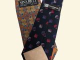 two ties that are laying next to each other