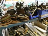 a lot of different types of wheels on a shelf