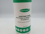 un gros plan d'un flacon de lingettes Aseptonet posé sur une surface blanche