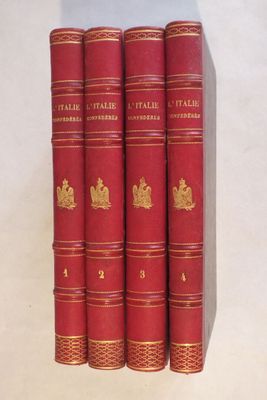 un lot de quatre livres rouges posés sur une table blanche