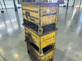 a stack of crates sitting in a warehouse