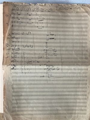 a piece of paper that has a sheet of music written on it