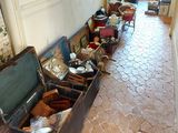 a lot of old suitcases that are sitting on the floor