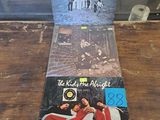 a picture of a book on a table with a picture of the beatles